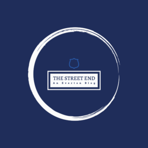 A Blue Background with a white circle. Inside the circle there is a square with a White background that says The Street End An Everton Blog